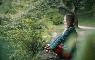 meditating-by-the-lake