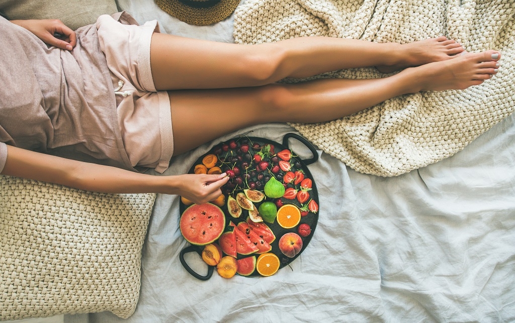 Summer healthy clean eating breakfast in bed concept, copy space Summer healthy